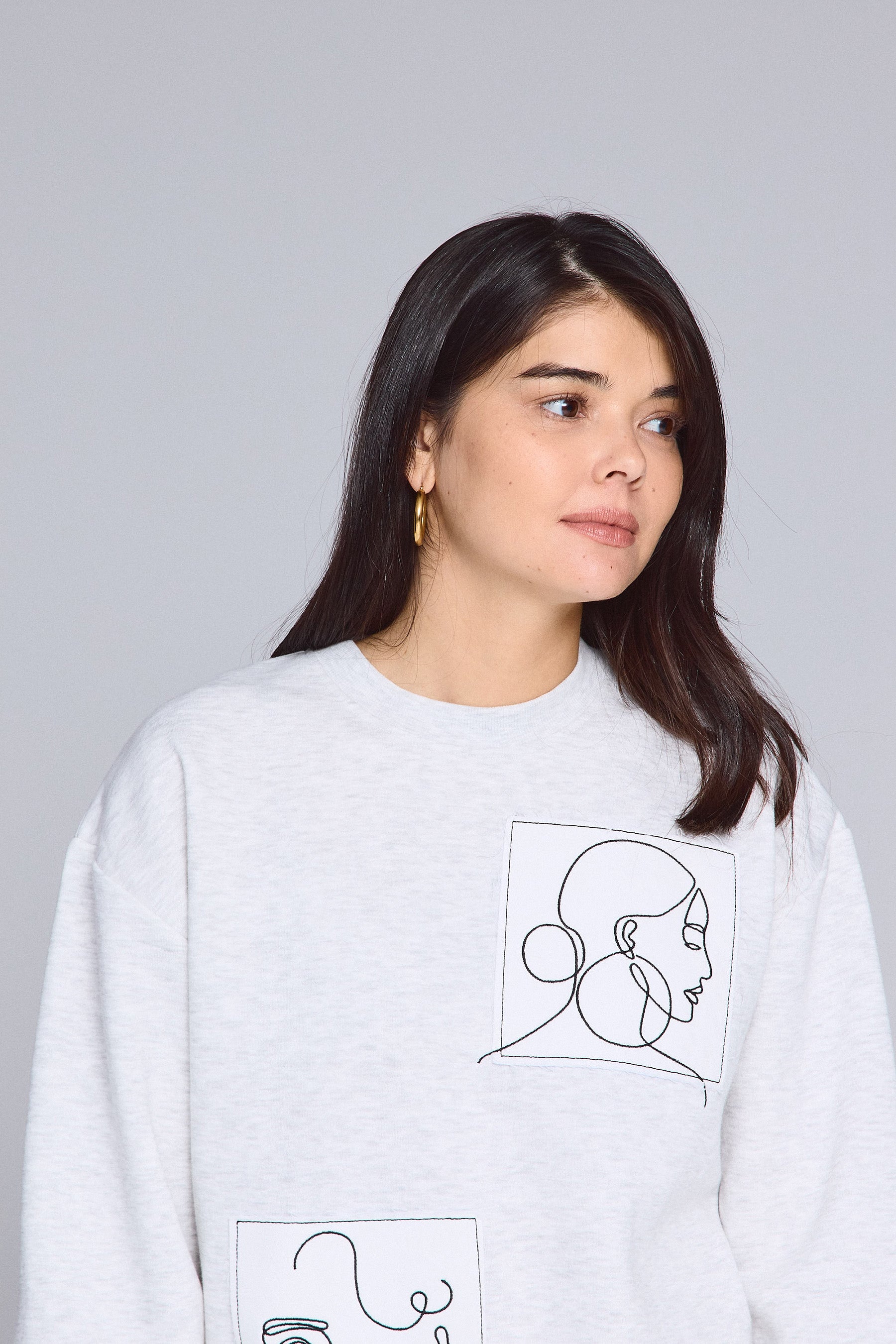 סוויטשירט פטצ'ים פוטרט נשים