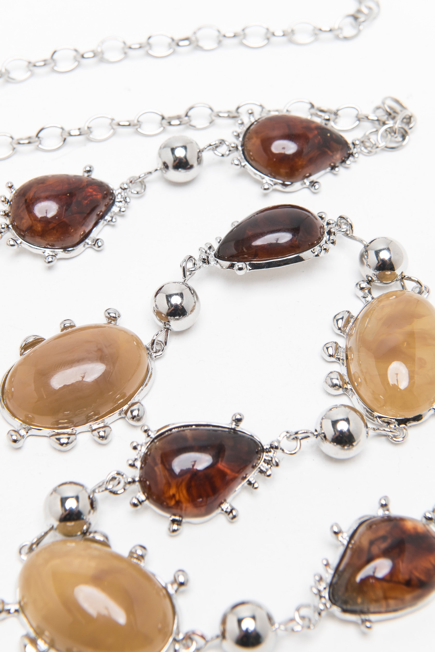 חגורת שרשרת מטאלית אבנים