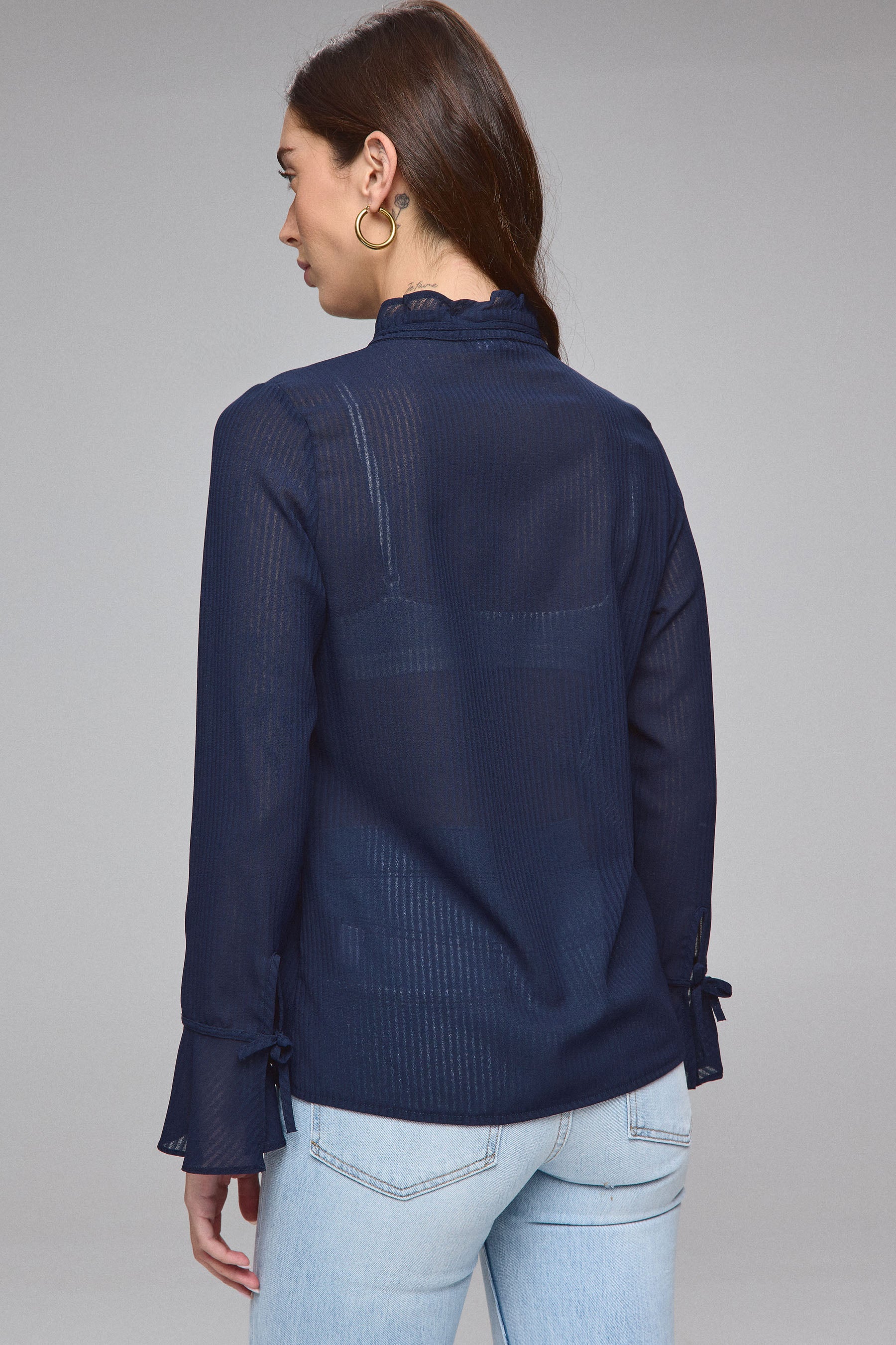 חולצת מכופתרת בד שורות